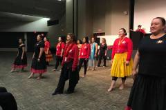 Kumu Nani & her alakaʻi performing Kuʻu Poliʻahu with their Hula Camp class at the Sunday Hōʻike
